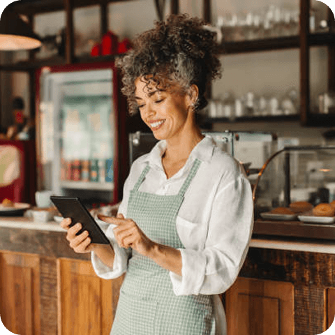 Restaurant owner using tablet